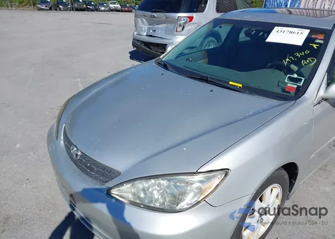 2004 Toyota Camry Xle z USA, uszkodzony, nr VIN 4T1BE30K54U928149